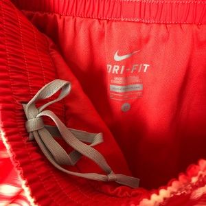 peach color nike shorts